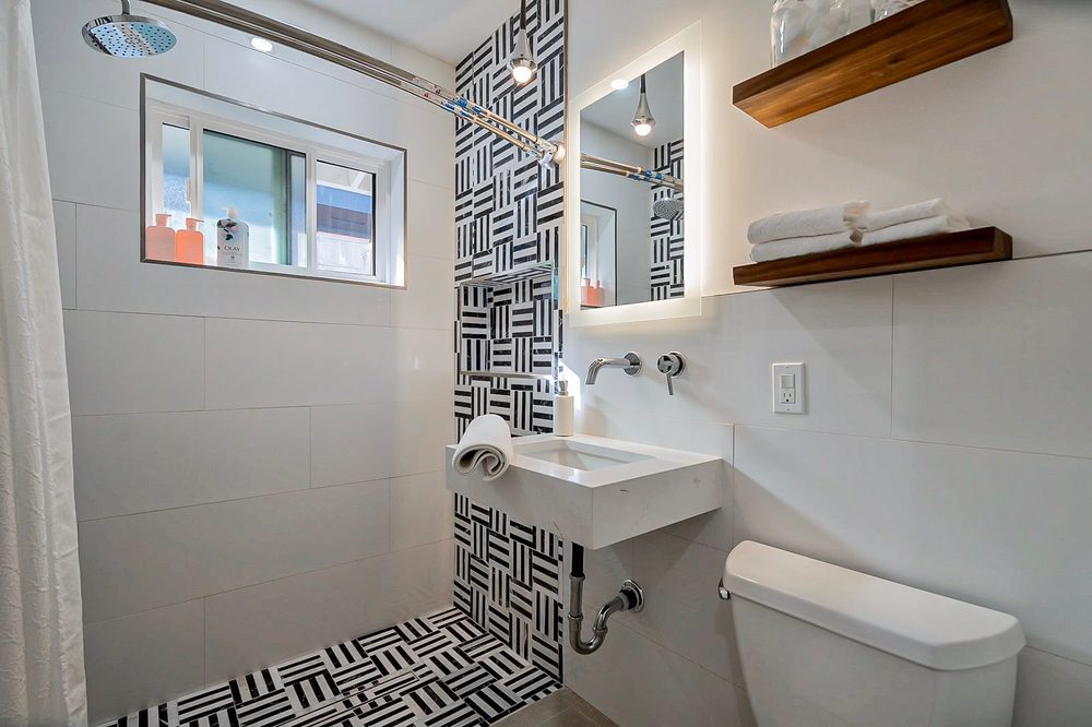 Suite bathroom with graphic tile pattern at Second Sunrise Recovery