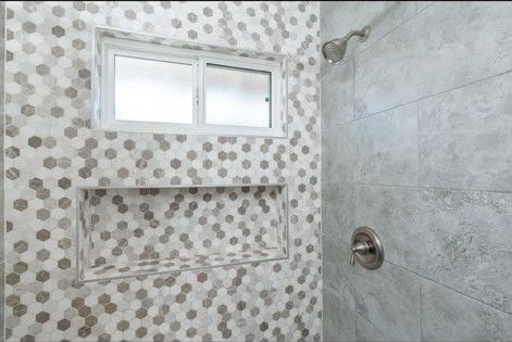 Suite shower with hexagon mosaic tile at Second Sunrise Recovery
