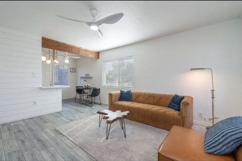 Suite living room with shiplap accent wall at Second Sunrise Recovery