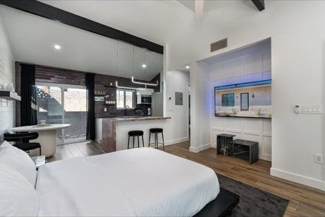 Suite bedroom with accent lighting at Second Sunrise Recovery